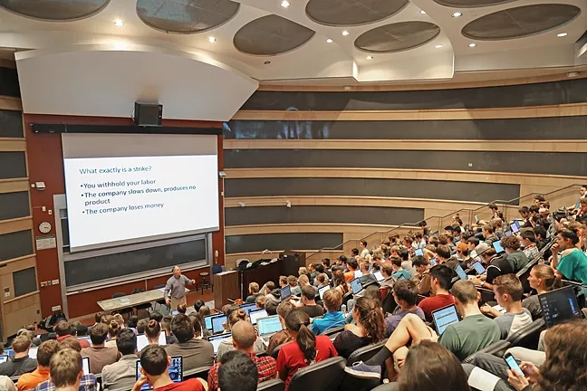 OUT IN THE OPEN: Glen Thorncroft, a professor of mechanical engineering, gives a guest lecture in March to a freshmen class about the ethics of a strike in an educational institution. - PHOTO BY DYLAN HONEA-BAUMANN