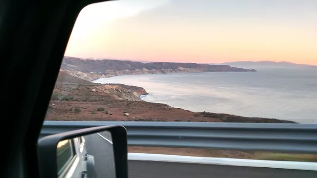 SO MANY VIEWS, SO LITTLE TIME: One of the crew’s trucks whizzes by a picturesque beach in Mexico. - PHOTO COURTESY OF COASTRIDERS POWERSPORTS