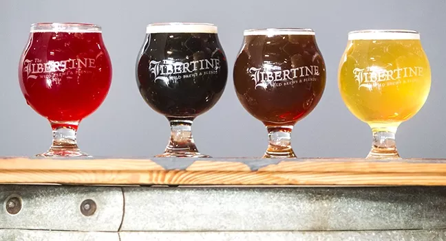 SWEET TO BE SOUR: At Libertine Brewing Company, you can kick back with a range of flagship brews—including Libertine Pacific Ocean Blue Gose, Wild IPA, Central Coast Saison, Edna Table Saison, 1234 Broad St., and Aubree Rye Saison—or go for a more familiar craft beer favorite, a glass of local wine, cold brew coffee, or kombucha. - PHOTO BY JAYSON MELLOM