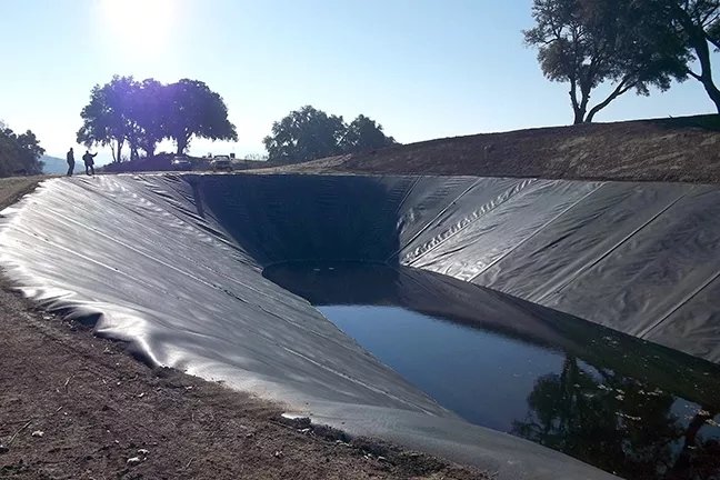 POND PROBLEMS: This 4-acre-foot ag pond serves a vineyard on Willow Creek Road west of Templeton. The permitting process for ag ponds is under fire after a series of controversial ag ponds inflamed tensions in the community over water availability. - PHOTO COURTESY OF THE UPPER SALINAS-LAS TABLAS RESOURCE CONSERVATION DISTRICT