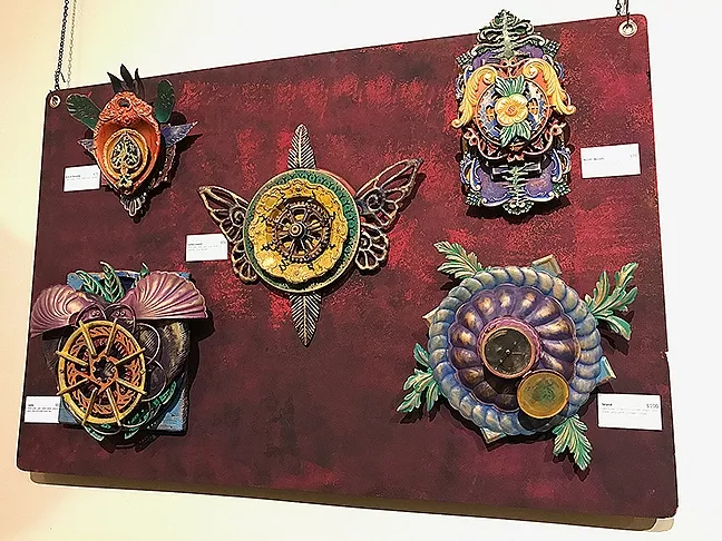 REPURPOSED PALETTE: Gears, compasses, silver dishes, lazy Susans, and Jell-0 molds are all a part of artist Janelle Younger’s palette of found objects. - PHOTO BY TREVER DIAS