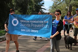 PHOTO COURTESY OF THE AMERICAN FOUNDATION FOR SUICIDE PREVENTION SLO CHAPTER - SUPPORTIVE SPACE The Out of Darkness Walk is a safe place for friends and families to come together to honor their loved ones, talk, heal, and learn about suicide prevention.