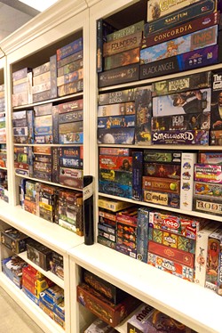 Edmond Unplugged is home to a wall of board games, which can be enjoyed within the store, for a $5 per player fee. - KENDRA MICHAL JOHNSON