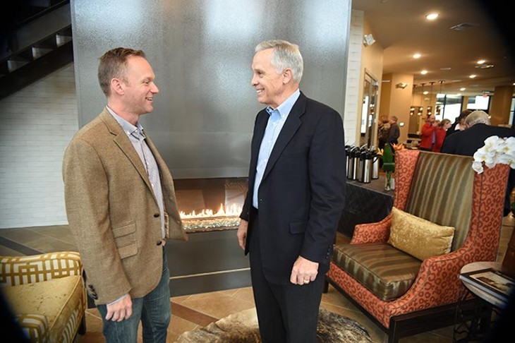 Ben Sellers with Wayne Properties, visits with Ex-OKC Mayor, Kirk Humphreys, during an open house at The Edge, 11-4-14.  mh