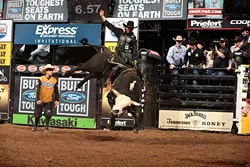JB Mauney attempts to ride Wolf Creek/Shepherd Hills Cutlery/Tom Luthy's Shepherd Hills Stockman during the championship round of the Oklahoma City Built Ford Tough series PBR. Photo by Andy Watson - ANDY WATSON