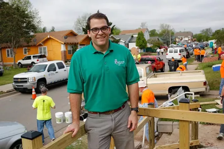 Jonathan Merrick during Rebuilding Day in the Classen Ten Penn neighborhood in Oklahoma City, Saturday, April 18, 2015. - GARETT FISBECK