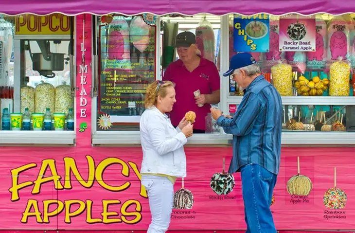 A couple celebrates its 30th year of coming to the fair together. (Shannon Cornman)