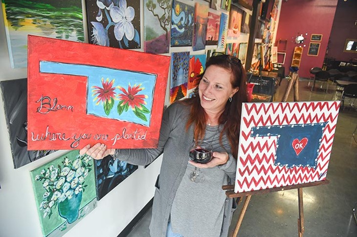 Marie Ensign, owner of Wine & Palette, with a couple of the "Pick One" state themed paintings guests can paint during the NAMI Oklahoma fundraiser, at Wine & Palette, 201 N.W. 10th Street, 11-4-15. - MARK HANCOCK