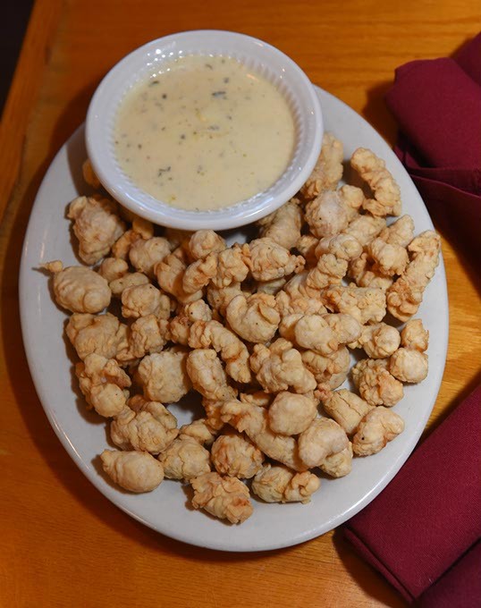 Fried Alligator with white gravy, at The Shack, 303 NW 62nd Street, 10-28-15. - MARK HANCOCK