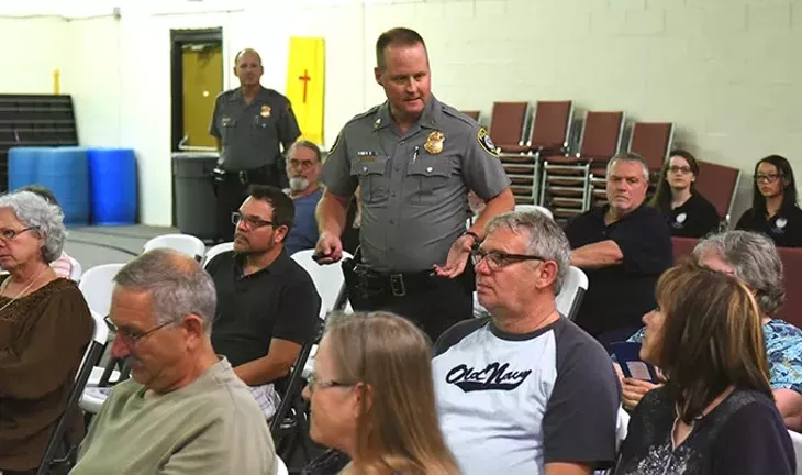 Master Sargent Robert Henderson engages the crowd, Thursday night during a "Crime Prevention Through Environmental Design" workshop in south OKC. mh