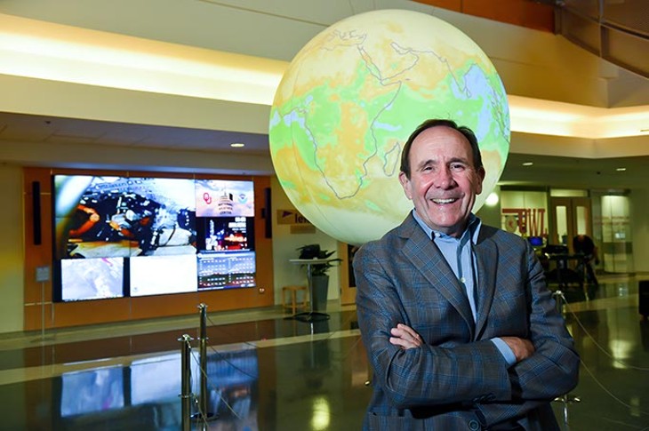 Dr. Berrien Moore, Dean of the College of Atmospheric & Geographic Sciences and the Director of the Nation Weather Center in Norman, in the central atrium near the entrance at the National Weather Center in Norman.  mh