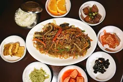Jap-Chae, surrounded with sides, at Dong-A Korean Restaurant in Moore, Oklahoma, 1-22-16. (Mark Hancock0