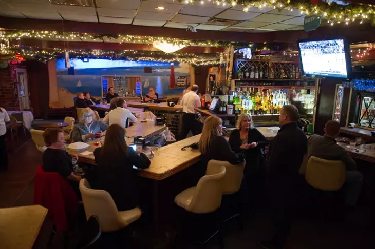Guests enjoy cocktails and beer at Nancy's 57th Street Lighthouse in Oklahoma City. (Garett Fisbeck)