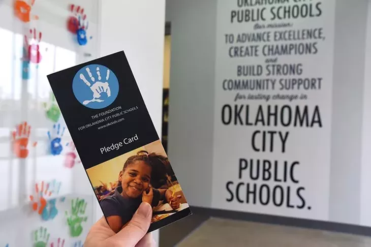 The Foundation for Oklahoma City Public Schools Pledge Card, in the entrace to their offices in Downtown Oklahoma City, 1-22-16. - MARK HANCOCK