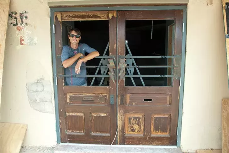 Clay Berkes looks out the front door of The Powerhouse in the Farmers Market District (Shannon Cornman)
