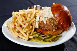 Hawaiian Pork sandwich at Scratch Kitchen in Norman, Wednesday, March 9, 2016. - GARETT FISBECK