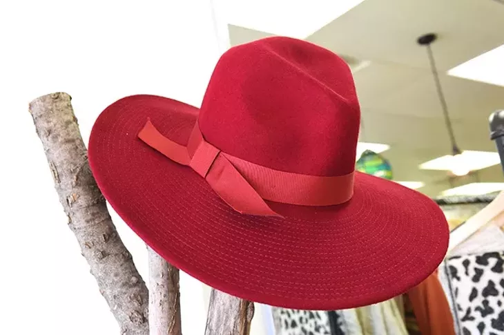 A wide brimmed red hat, at Milo & Lily Boutique, on North May Avenue in OKC, 11-11-15. - MARK HANCOCK