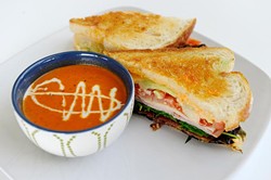 Goodie Club Sandwich and fire-roasted tomato basil&nbsp;soup at Green Goodies in Oklahoma City, Tuesday, Dec. 23, 2014. - GARETT FISBECK