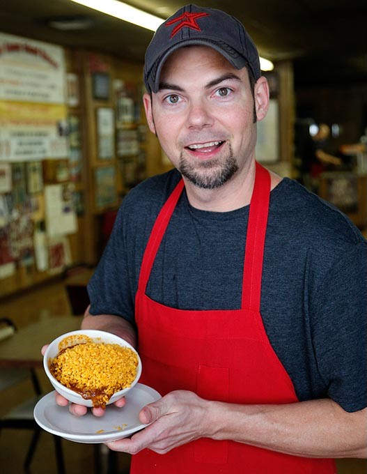 Ronnie poses with Frito Chili Pie in Oklahoma City, Wednesday, Sept. 2, 2015. - GARETT FISBECK