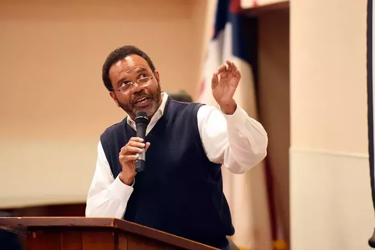 Gary Jones, KIPP parent, speaks during a OKCPS Charter School expansion meeting at Fairview Missionary Baptist Church, Tuesday, April 5, 2016. - GARETT FISBECK