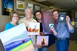 At Denton Framing, owners prepare for their Mix of Six Art Show to be held at Fine Arts Museum in Edmond. From left Mary Lou Moad, John Moad, Mikah Moad, Mark Moad.Photo/Shannon Cornman