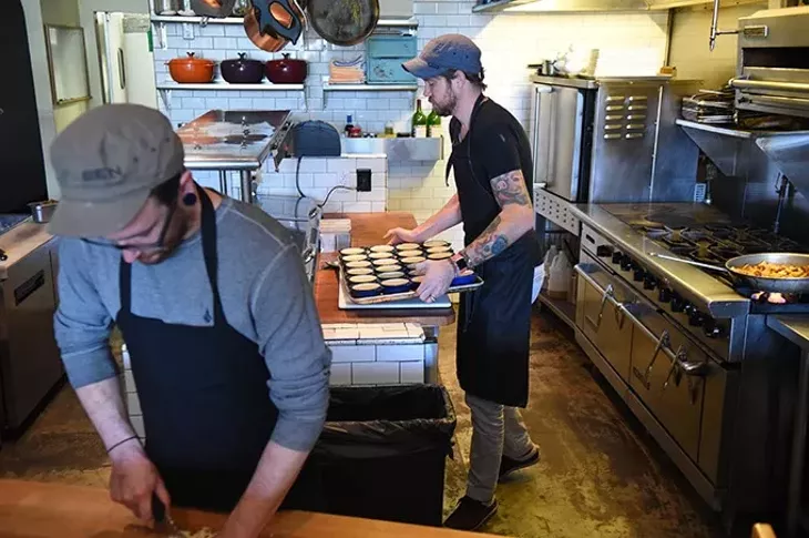Left to right, Alex Moyer, cook, and Jonathan Stranger, owner, chef, work on food mid-day before their evening diner time opening, Monday, 9-21-15. - MARK HANCOCK
