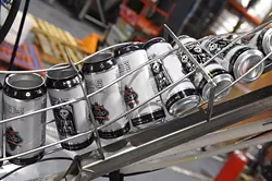 Spare Rib Pale Ale containers just before filling, on the assembly line at Coop Ale Works, Oklahoma City, 2-10-16. - MARK HANCOCK