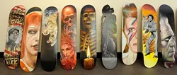 Painted skateboards at Mind Bender Tattoo Shop in Oklahoma City, Wednesday, July 22, 2015. - GARETT FISBECK