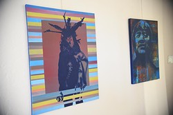 2 works by Chicasaw artist Billy Hensley, left, "Sacred", next to "Thorpe", currently featured at Exhibit C native art gallery celebrating one year open in Bricktown.  mh