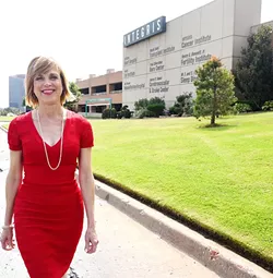 Dr. Mary Ann Bauman walks in front of Integris Baptist Medical Centerc 3300 N.W. Expressway, 9-30-15. - MARK HANCOCK