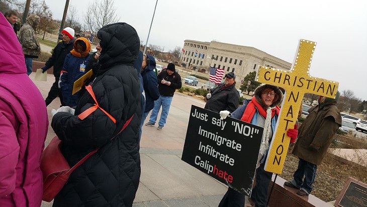 Protesters shouted at Muslims entering the capitol on Feb. 27, 2015. - BEN FELDER