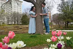 Ardin Walker as "Luisa" and Nate Stukey as "Matt", play around a tree in this promotional shot for the Lyric Theatre production of "The Fantastics", photographed at the Myriad Botanical Gardens, 3-11-16. - MARK HANCOCK / FOR THE GAZETTE