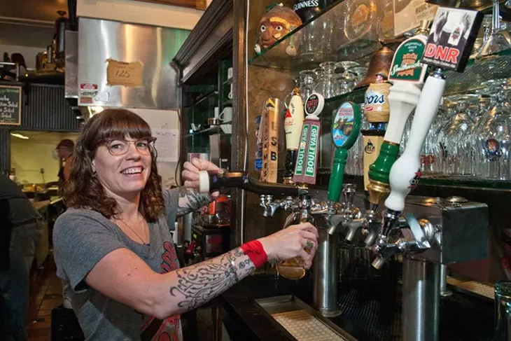 Bartender Priscilla Angelico draws a Guinness at VZD's. (Mark Hancock / File)