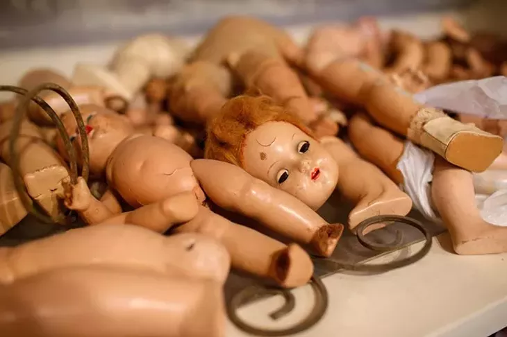 Doll body parts at Sisters Doll Hospital in Guthrie, Monday, Oct. 12, 2015. - GARETT FISBECK