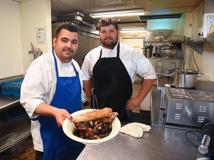New head chef, Mitchell Dunzy, left, prepared this dish of steamed Mussels, with help from his Sous Chef Wes Cochran, in the kitchen at Saints. - MARK HANCOCK