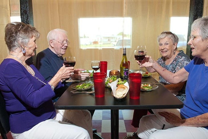 From left, Helen and Jim Fisher from Yukon, Betty Cluck and Marsha Fisher, at The Vine.  mh