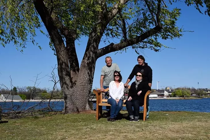 Mike and Marilyn Gushwa, and Steve and Kim Iraggi, who are involved in the planning of the Ski Island sock burning ceremony, pose for a photo, Tuesday, March 15, 2016. - GARETT FISBECK