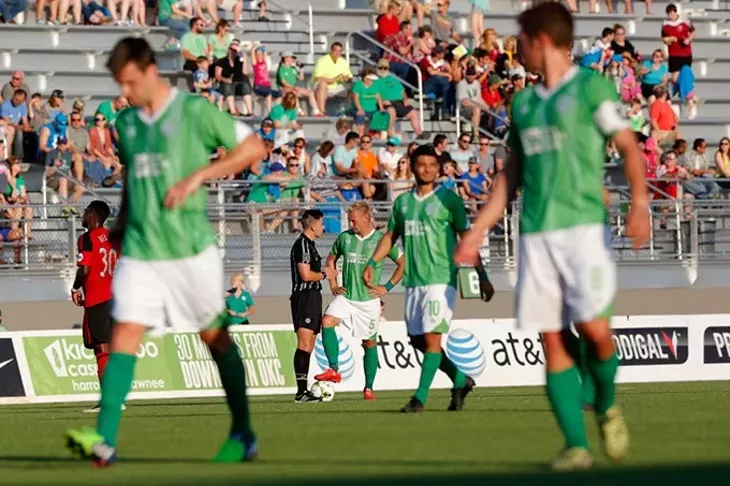 Oklahoma City's Gareth Evans (5) talks with an official during a game between Energy FC and T2 at Taft Stadium in Oklahoma City, Friday, June 5, 2015. - GARETT FISBECK