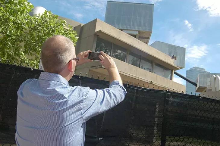 David Pettyjon, with Preservation Oklahoma takes a final snap shot of Stage Center before demolition in Oklahoma City, Okla. Photo by Ben Felder - BEN FELDER