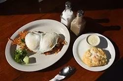 Fiesta loaded hashbrowns and a homemade biscuit with gravy. (Mark Hancock)