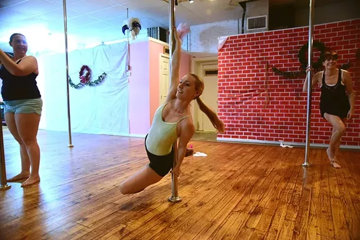 Lynn Crowe, owner, during an evening workout session at Tease Dance & Fitness. mh