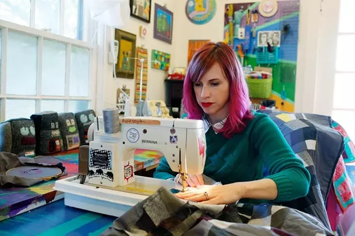 Sara Cowan pieces a quilt at her home in Oklahoma City, Thursday, Oct. 29, 2015. - GARETT FISBECK