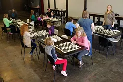 Girls’ and Women’s Chess Club meet the last Saturday of each month at District House, located in Plaza District. (Garett Fisbeck)