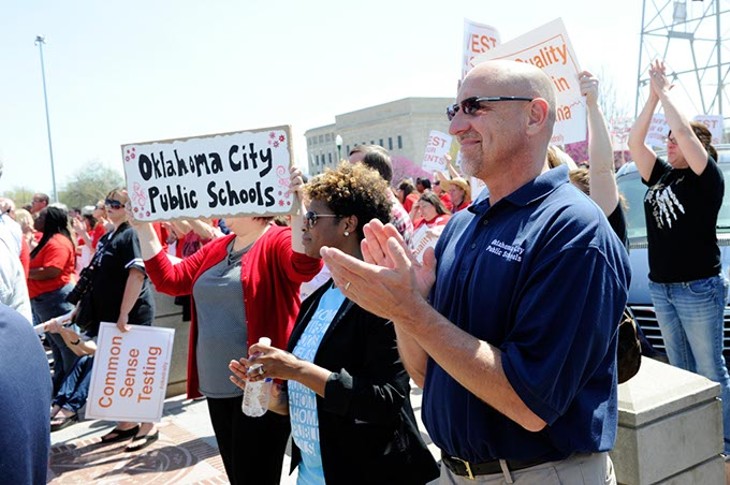Thousands gather on at the Oklahoma State Capitol for a Teacher's Rally, Monday, March 30, 2015. - GARETT FISBECK
