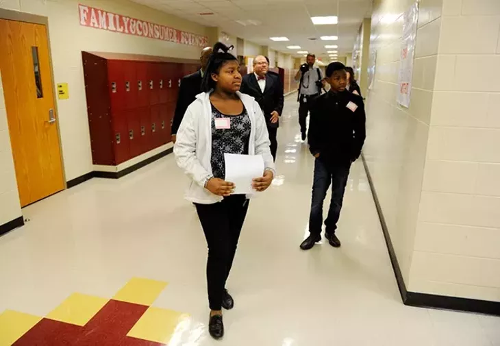Breyell Thompson, left, and Jemi Thompson lead a tour at Centennial High School in Oklahoma City, Wednesday, Jan. 28, 2015. - GARETT FISBECK