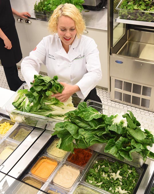Chef Beth Ann Lyon  with fresh lettuce and more at Provision Kitchen in Nichols Hills Plaza, 10-1-15. - MARK HANCOCK