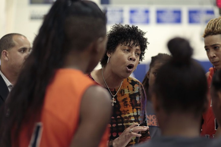 Cheryl Miller pushed her team during a timeout in Langston's first game of the  new season. - LAUREN HAMILTON