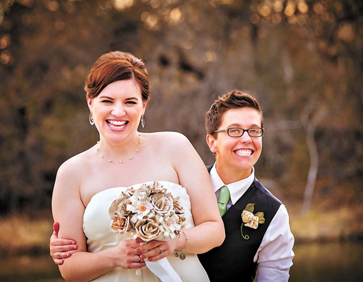 Cute newlywed gay couple laughing and standing together - BIGSTOCK