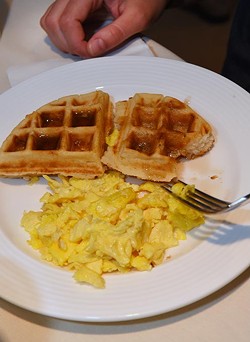 A plate of eggs and waffles during the Stella Artois Waffles and Beer Filmmaker Brunch at the OKCMOA, Friday morning, day 2 of the DeadCenter Film Festival. - MARK HANCOCK