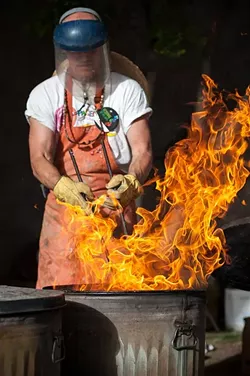 An artist demonstrates his trade at the 2015 Oklahoma City Festival of the Arts. (Provided)
